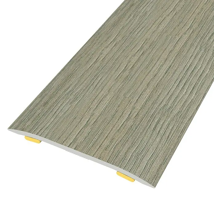Baglinox Junta de transición Roble - E6 - 90 cm x 38 mm, Pegado - Imagen de un perfil de transición con aspecto de madera y fijaciones amarillas, ideal para transiciones de suelo.