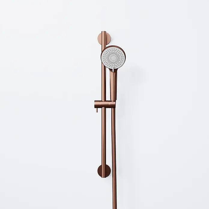 Vola Duschsystem -  - Roségoldene Duschstange mit passender Handbrause.