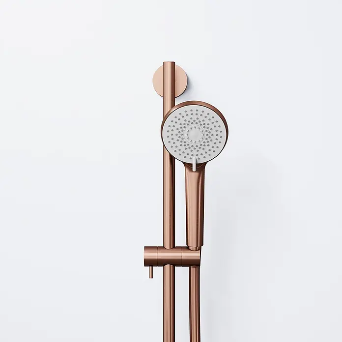 Vola Duschsystem -  - Roségoldene Brausestange mit passendem Handbrausekopf.