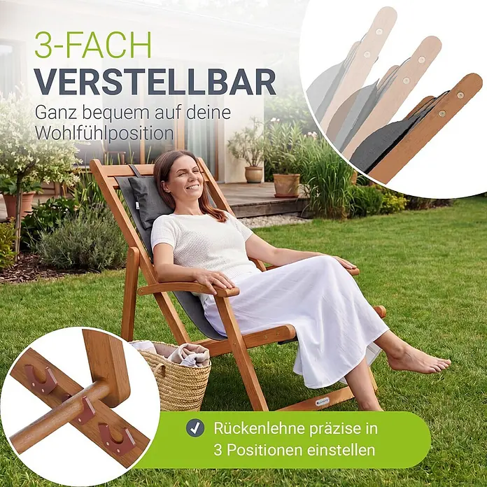 Juskys Strandstuhl Tavira - Holz, Klappbar, Anthrazit, B x T x H: 60 x 110 x 110 cm - Verstellbarer Holz-Liegestuhl mit dunklem Kissen, in dem eine Frau im Garten entspannt. Rückenlehne in 3 Positionen einstellbar.