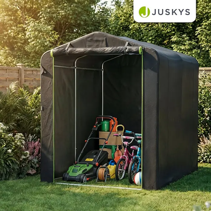 Juskys Fahrradgarage Gerätezelt - Metall, Anthrazit - Schwarzes Stoff-Gartenlagerzelt mit grünen Akzenten, das einen Rasenmäher, Gartengeräte und Kinderfahrräder auf einem sonnigen Rasen beherbergt.