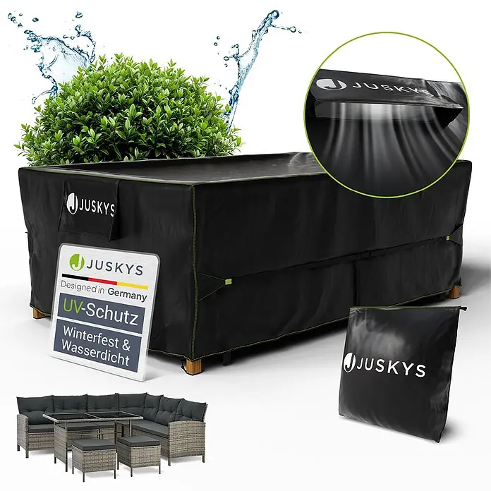Juskys Loungemöbel-Schutzhülle CoverSafe - L x B x H: 220 x 140 x 75 cm, Material: 420D Oxford-Gewebe (100 g\m2), PU-Beschichtung, 100 g/m², schwarz - Schwarze Outdoor-Möbelabdeckung mit grünen Nähten, wasserdicht und UV-Schutz, über einer Terrassengarnitur.