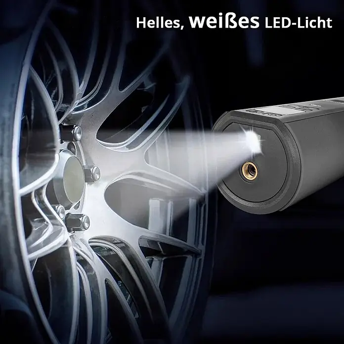 STAHLWERK Kompressor HF-800 ST - 80 W, Max. Druck: 4,2 bar, Schmierung: Ohne - Dunkelgrauer tragbarer Luftkompressor mit hellem LED-Licht, das ein silbernes Autorad beleuchtet.