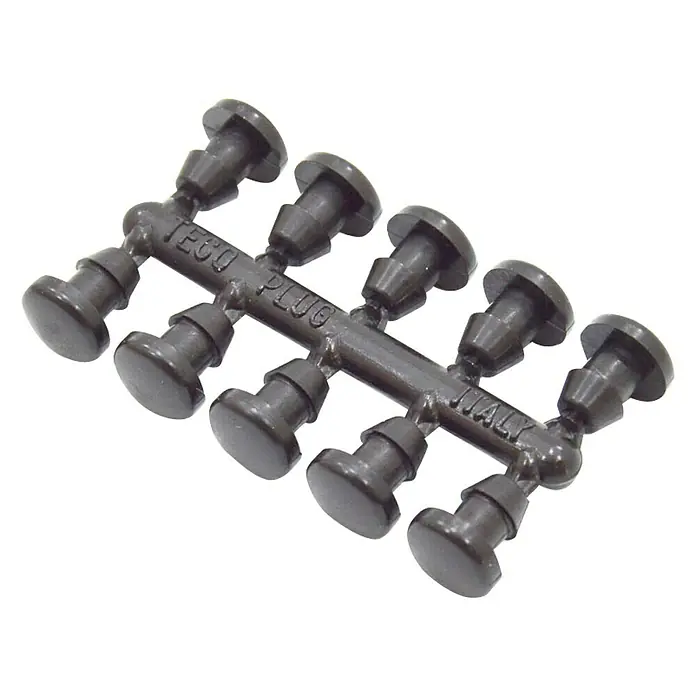 Tapón final Goteo - Diámetro: 4 mm, 10 ud. - Primer plano de una fila de tapones negros TECO PLUG, interconectados para facilitar su uso y almacenamiento.
