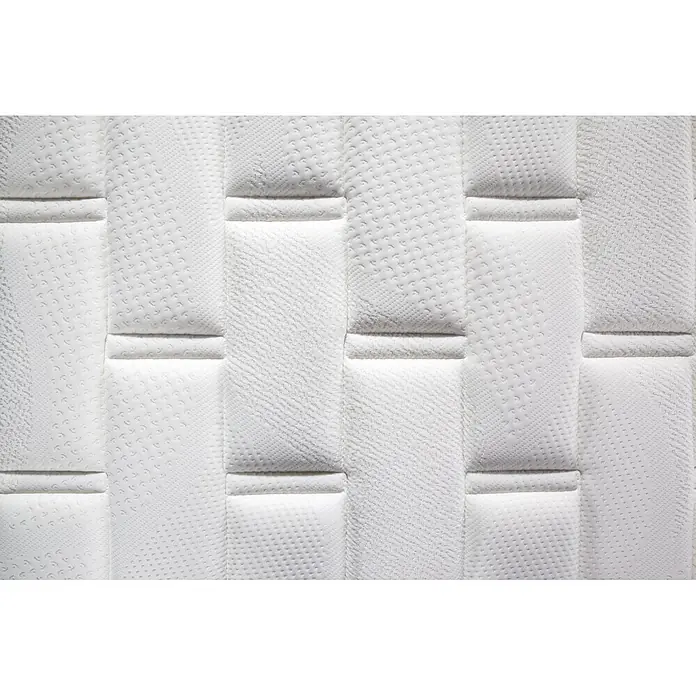 Nonnos Bedding Colchón Spring Visco - Largo: 190 cm, Ancho: 80 cm, Altura: 26 cm, Viscoelástica - Superficie de colchón blanca acolchada con varios patrones tejidos y secciones rectangulares elevadas.