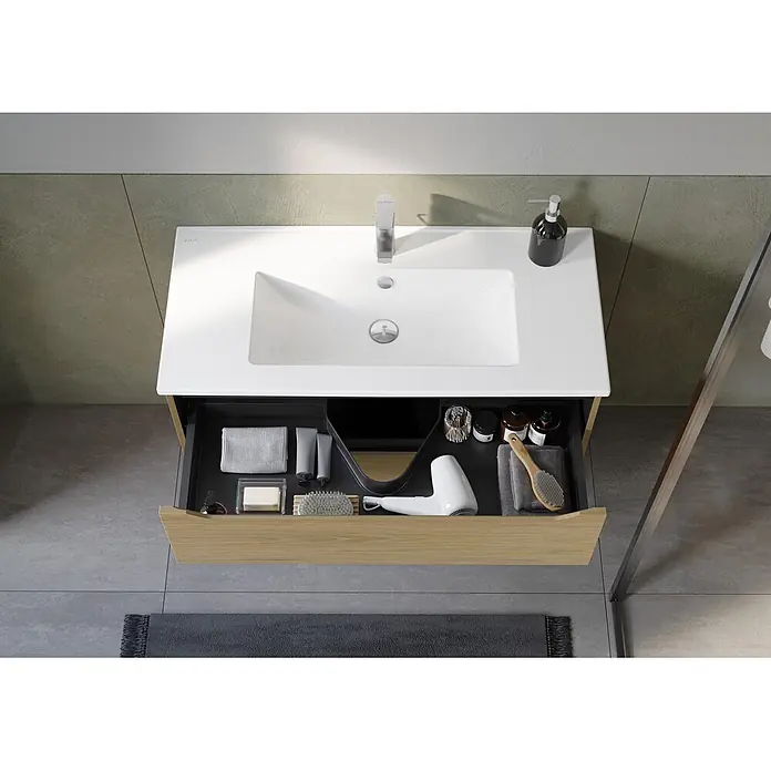 VitrA Integra Square Badmöbel-Set - Gesamtbreite Badmöbel: 100 cm, Eiche Gold - Draufsicht auf einen modernen Badschrank mit weißem Waschbecken und offener Eiche-Schublade für Toilettenartikel.