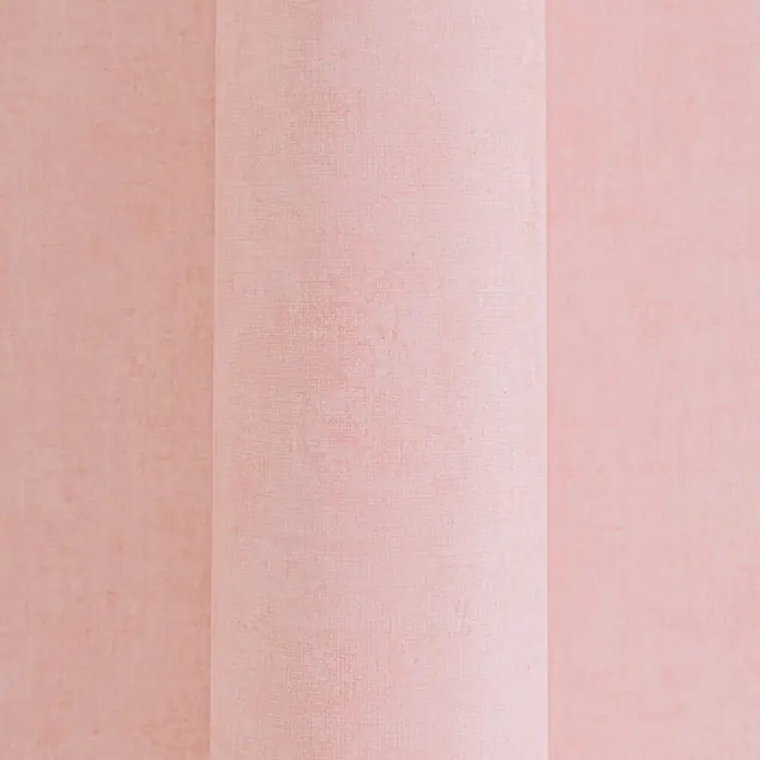 Profhome Vliestapete Vliestapete Kindertapete, Used Look, Textiloptik, Uni in rosa - lachs-rot, 10.050 x 530 mm - Strukturiertes hellrosafarbenes Material mit einer sanften vertikalen Biegung.