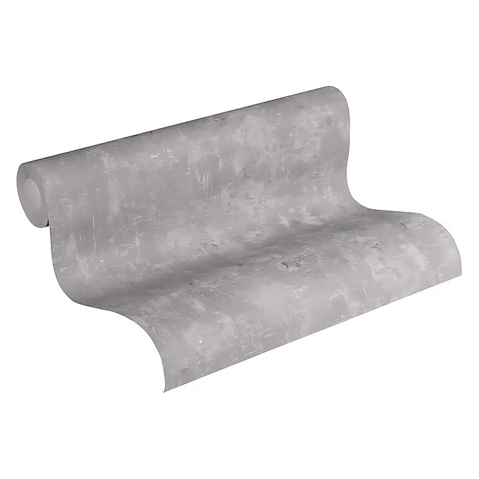Profhome Vliestapete Vliestapete Uni grau - Uni, 10.050 x 530 mm - Graue Tapetenrolle mit Used-Look in Betonoptik, teilweise abgerollt.