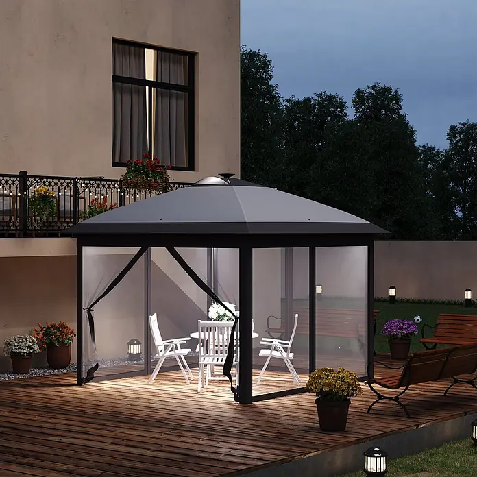 Outsunny Faltpavillon - B x T: 3,3 m x 330 cm, Farbe Dach: Grau - Dunkelgrauer Pavillon mit schwarzem Rahmen und Netzseiten, nachts beleuchtet auf einer Holzterrasse.