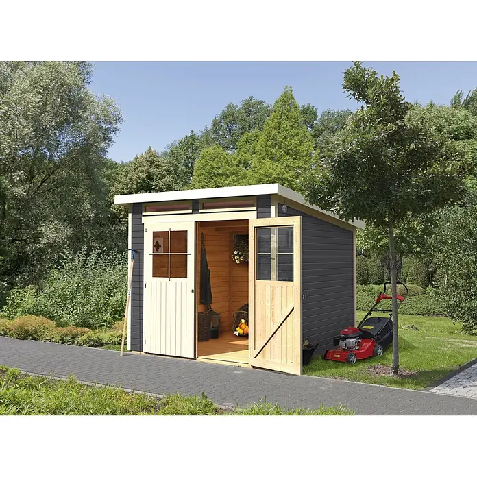 Karibu Gartenhaus Glücksburg - Außenmaß inkl. Dachüberstand (B x T): 242 x 175 cm, Holz, Terragrau, Grundfläche: 3,02 m² - Ein geräumiges Gartenhaus mit geöffneten Türen und einem Rasenmäher daneben, umgeben von üppigem Grün.