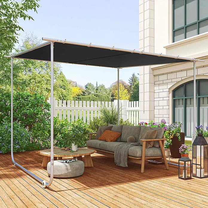 Outsunny Pergola - Farbe Gestell: Grau, Stahl - Schwarze freistehende Pergola beschattet eine Outdoor-Sofa- und Couchtisch-Sitzgruppe auf einer Holzterrasse.