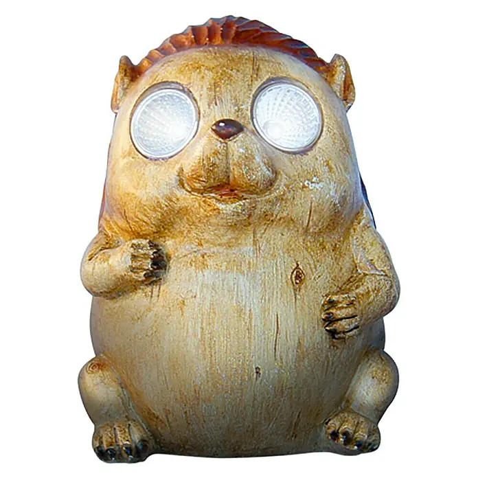 BAUHAUS Solar-Dekoleuchte Marmot - IP44, Lichtfarbe: Neutralweiß - Bild einer Igel-Gartenleuchte mit Solaraugen, die ein warmes Licht ausstrahlt, ideal für die Dekoration im Freien.