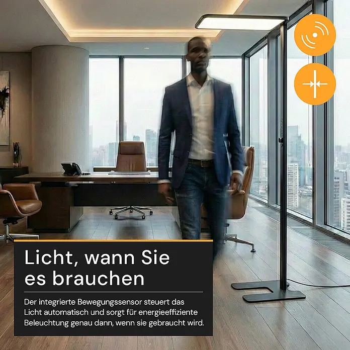 Enovalite LED-Stehleuchte - 150 W, Höhe: 199 cm, Schwarz, Neutralweiß - Eine moderne schwarze Stehlampe mit Bewegungssensor leuchtet in einem Büro, während ein Mann vorbeigeht.