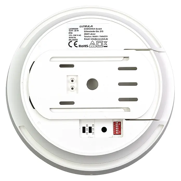Luxula LED-Deckenleuchte rund - 24 W, Weiß, Warmweiß - Rückseite einer runden, weißen LED-Leuchte mit Produktetikett, Anschlussbuchsen und einstellbaren Schaltern für Wattage, Farbtemperatur und DIP-Einstellungen.