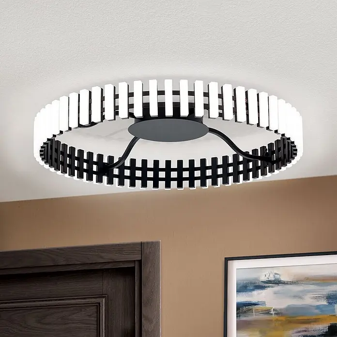 Orion Leuchten LED-Panel rund -  - Runde Deckenleuchte in Schwarz-Weiß mit rechteckigen Leuchtelementen, an der Decke montiert.