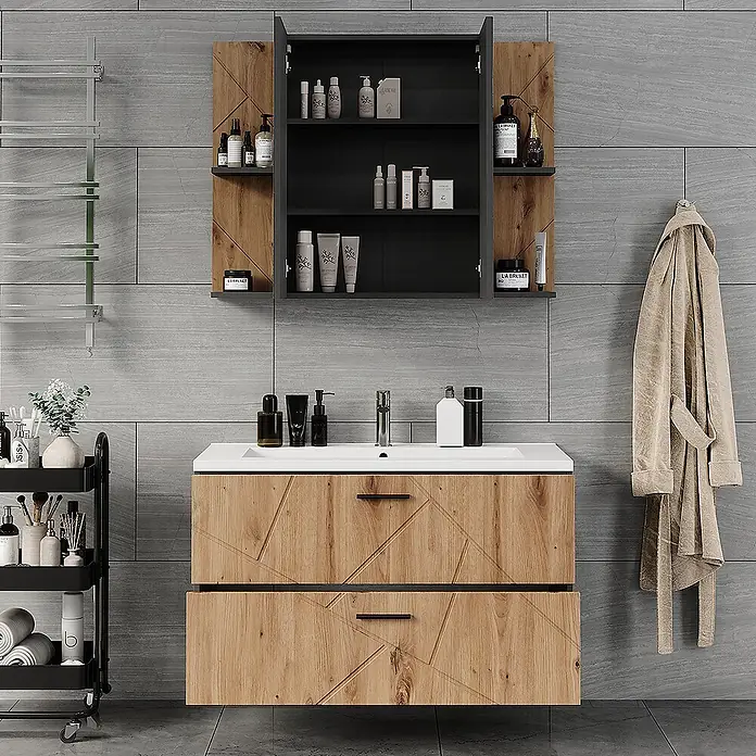 Vicco Badmöbel-Set Irma Anthrazit/Artisan 3 Teile - Anthrazit, Matt - Hölzerner Badezimmerschrank mit weißem Waschbecken, zwei Schubladen und passendem dunkelgrau/holzfarbenem Spiegelschrank, gefüllt mit Pflegeprodukten.