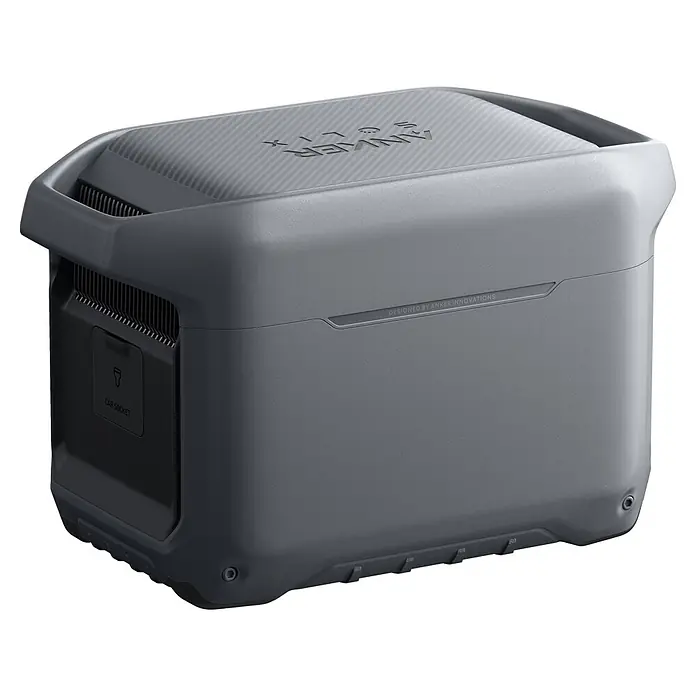 Anker Solix Powerstation SOLIX C1000 GEN2 - 1.024 Wh - Dunkelgraue Anker Solix Powerstation mit strukturierter Oberfläche, Carbonfaser-Oberseite, integrierten Griffen, Belüftung und einer Autosteckdose.