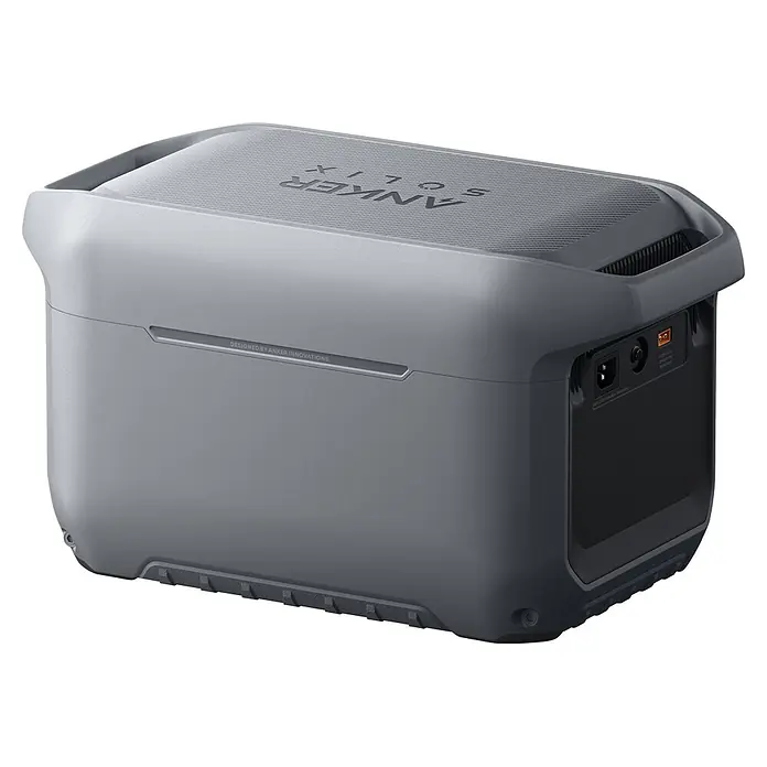 Anker Solix Powerstation C2000 Gen 2 - 2.048 Wh - Graue Anker Solix Powerstation mit texturierter Oberfläche, integrierten Griffen und verschiedenen Anschlüssen.