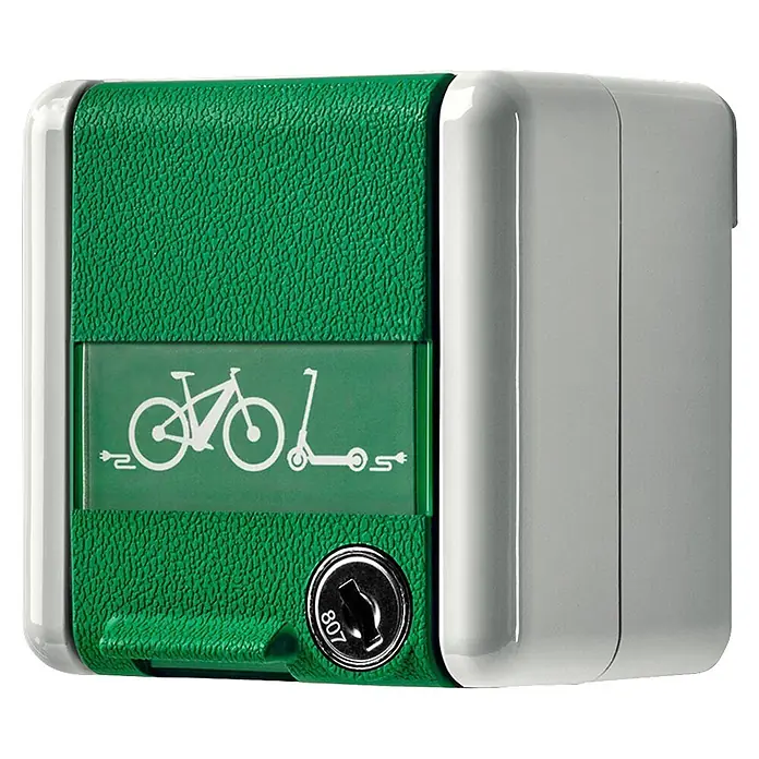 Jung Feuchtraum-Steckdose mit Schloss & E-Bike Ladesymbol - Grün, Grau, 1-fach, Ausrichtung Schalterprogramm: Horizontal, Aufputzmontage, IP44 - Grüne, texturierte Ladestation für E-Bikes/E-Scooter mit Symbolanzeige und Schlüsselschloss.