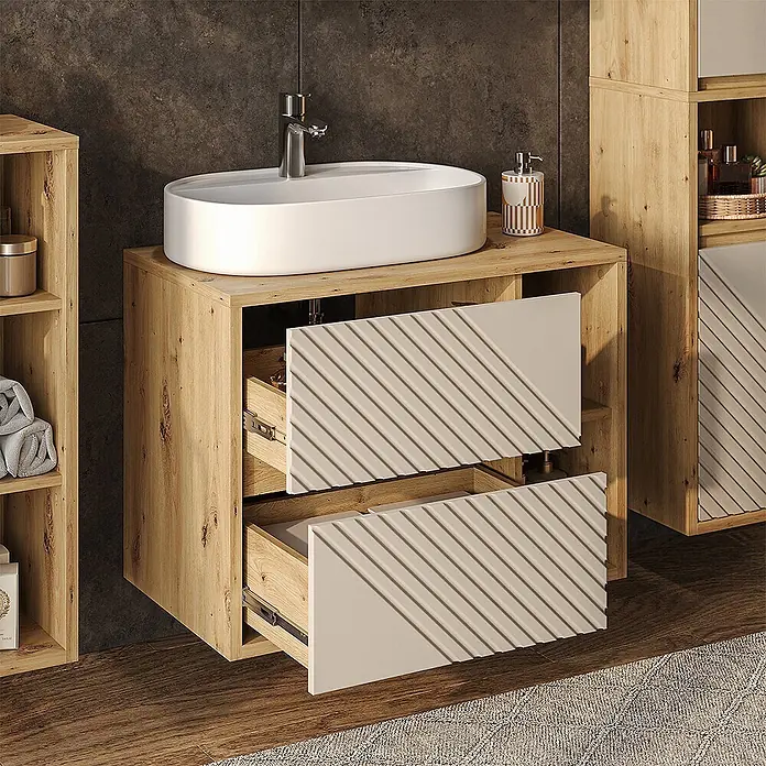 Vicco Badmöbel-Set - Artisan-Eiche, Matt - Hölzerner Badezimmer-Waschtisch mit weißem Ovalbecken und zwei Schubladen mit strukturierten beigen Fronten.