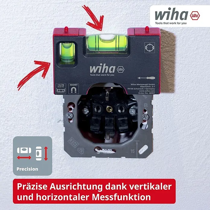 Wiha Taschenwasserwaage - 80 mm, Anzahl Libellen: 2 Stk. - Kompakte rote und schwarze Wiha Wasserwaage, magnetisch an einer Steckdose zur präzisen vertikalen und horizontalen Ausrichtung befestigt.