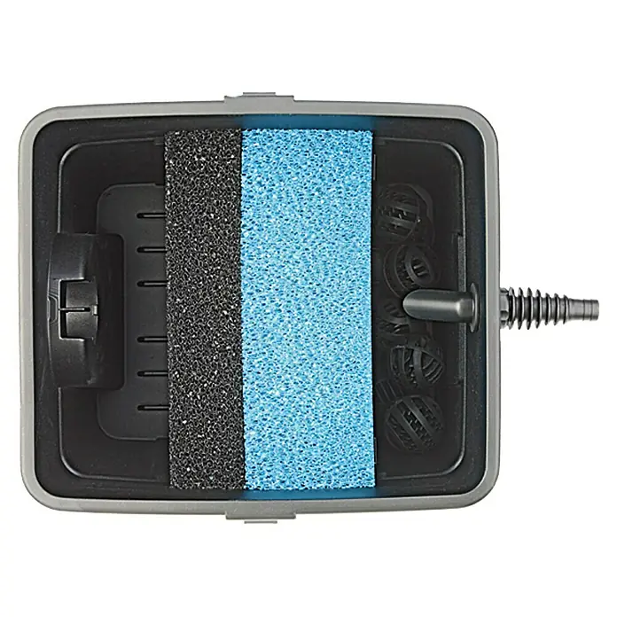 Neptun Classic Durchlauffilter-Set NCTF-O 4000 UV - Teichgröße: 4 m³ - Ansicht von oben auf einen Aquariumfilter mit schwarzem und blauem Schaumstoff und Biobällen.