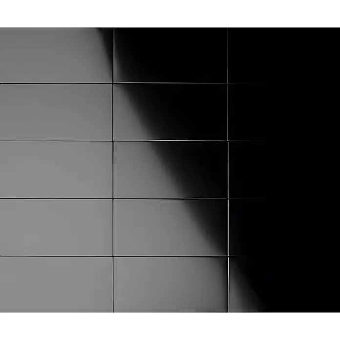 ALLOY Mosaikfliese Mosaik Fliese massiv Metall Titan hochglanz dunkelgrau 1,6mm Subway-Ti-SM - 76 x 152 mm, Schwarz, Grau, Hochglänzend - Gitter aus glänzenden dunkelgrau/schwarzen Rechteckpaneelen mit Hell-Dunkel-Verlauf.