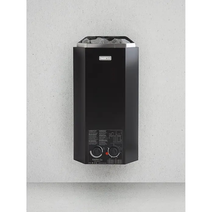 Palmako Saunaofen Narvi - 3,6 W, Raumheizvermögen: 2 m³ - 4 m³ - Schwarzer Narvi Elektro-Saunaofen mit grauen Saunasteinen darauf.