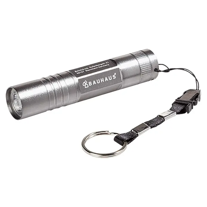 BAUHAUS Taschenlampe - 23 lm - Eine silberne Bauhaus-Taschenlampe mit Schlüsselanhänger, perfekt für den täglichen Gebrauch oder als Geschenk.