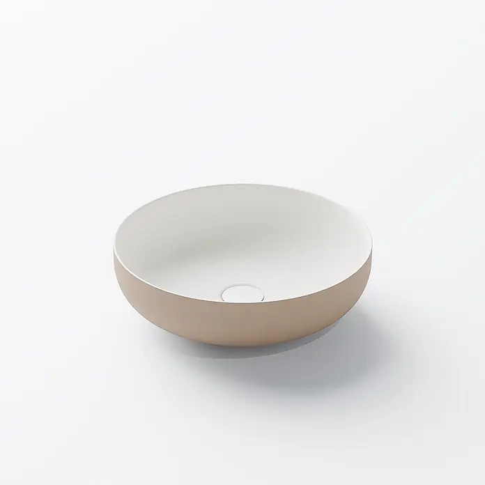 Vola Waschtisch - 0 x 0 cm - Modernes rundes Waschbecken mit hellbrauner Außenseite, weißer Innenseite und zentralem Abfluss.