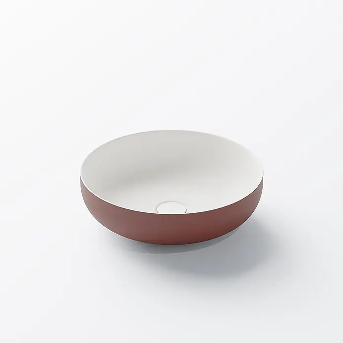 Vola Waschtisch - 0 x 0 cm - Runde, flache Waschbeckenschale mit rotbrauner Außenseite, weißer Innenseite und Abflussöffnung.