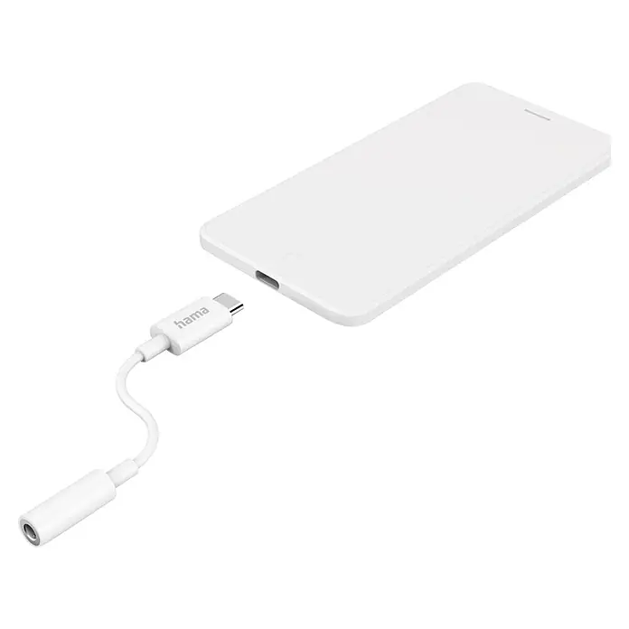 Hama Adapterkabel USB-C – 3,5-mm 201524 - Weiß - Weißes Smartphone, verbunden mit weißem Hama USB-C auf 3,5mm Audioadapter.