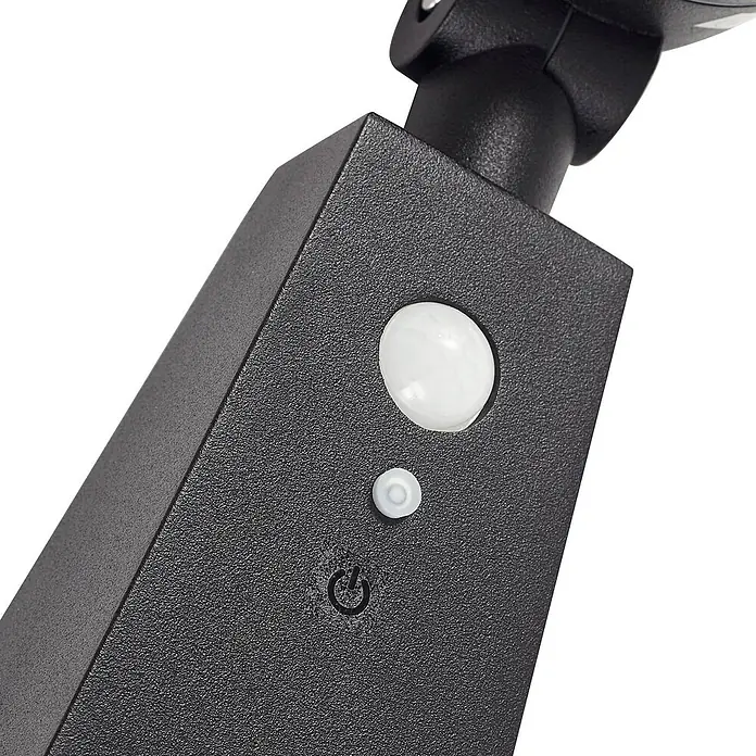 Lindby Außensockelleuchte Raide -  - Schwarze, strukturierte Sensoreinheit mit weißem Kuppel-PIR-Sensor, kleinem weißem Sensor und Stromsymbol.