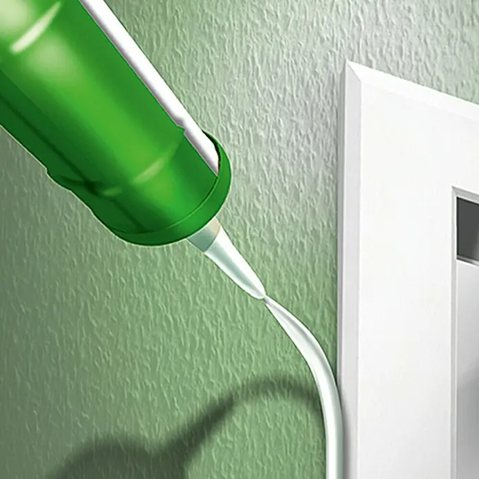 MEM Maleracryl Eco-Plus - Grau, 1 Stk. x 300 ml - Ein grüner Silikonpistolen-Applikator trägt Dichtmittel auf einen weißen Rahmen auf, um eine wasserdichte Abdichtung zu gewährleisten.