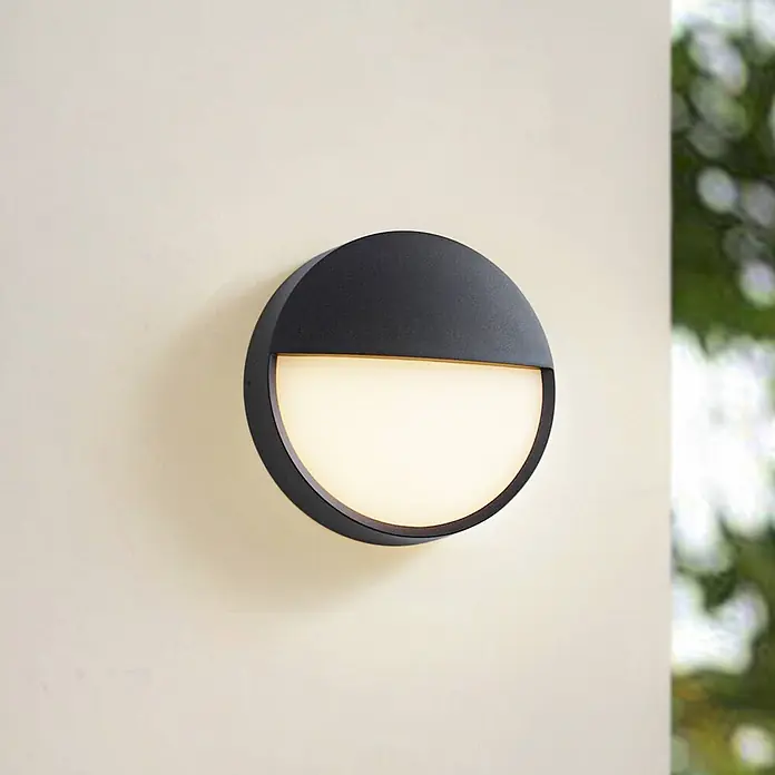 Arcchio Außenwandleuchte Gravo - schwarz, IP65 - Runde schwarze Außenwandleuchte mit warmweißem Lichtschein.