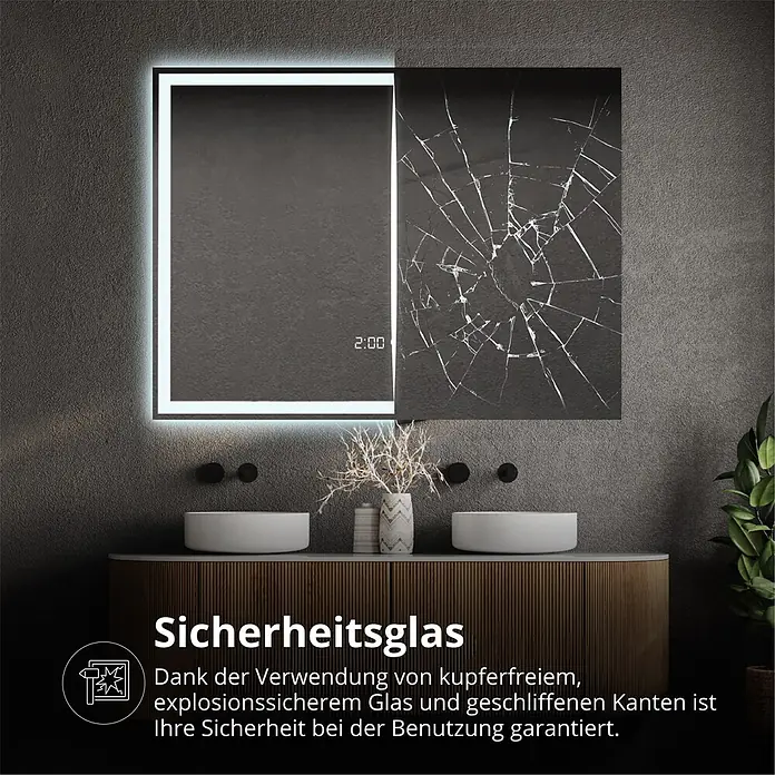Lumoire Lichtspiegel TRONVG -  - LED-Badspiegel zeigt Sicherheitsglas mit einer zerbrochenen Seite über Waschtischen.