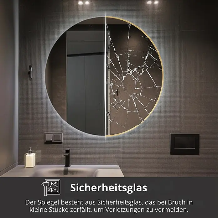 Lumoire Lichtspiegel RICHMOND - 100 x 100 cm - Ein runder, goldgerahmter Badezimmerspiegel mit Beleuchtung, halb intakt, halb zerbrochen, demonstriert Sicherheitsglas.