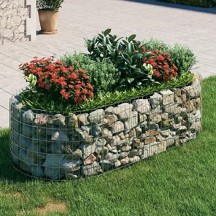Furnicato Gabionen-Hochbeet - 100 x 200 x 50 cm, Metall, Fassungsvermögen Erde: 1.000 g - Ovales Gabionen-Pflanzgefäß mit Steinfüllung und bunten Pflanzen im Garten.