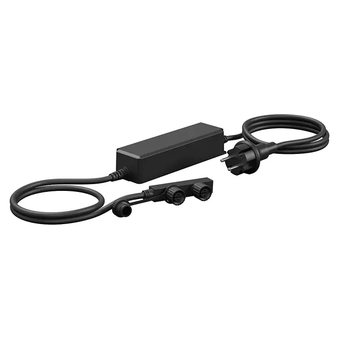 Steinel LED-Trafo 24V-Garten-Lichtsystems - Schwarz, 100 W - Schwarzes Netzteil mit AC-Stecker, verbunden mit einem Mehrfach-DC-Verteiler, ideal für Außenbeleuchtungssysteme.