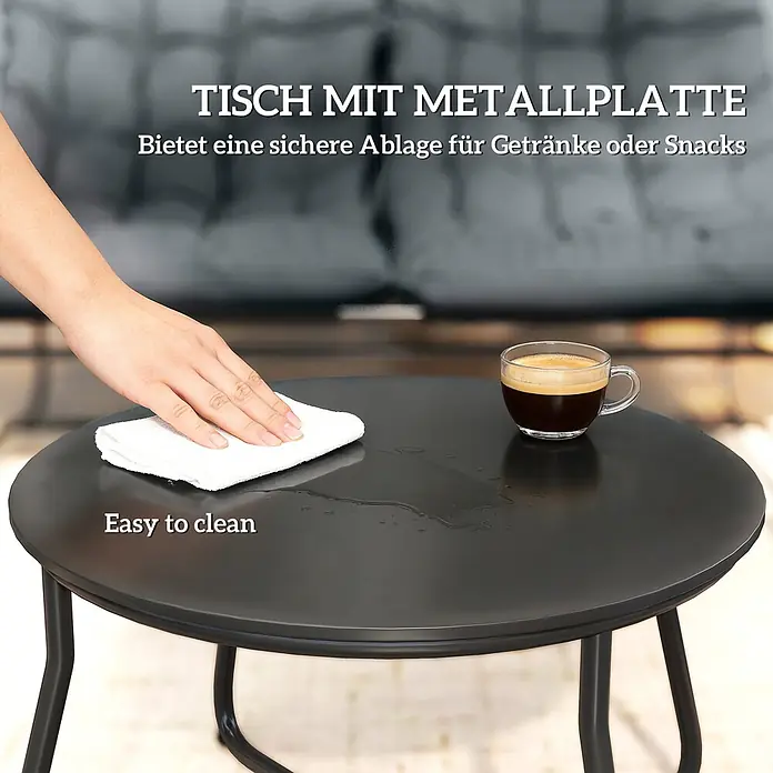 Outsunny Loungemöbel-Set mit Tisch - Stahl, Netzgewebe, Schaumstoff, Metall, 1x Couchtisch, 1x Sofa, 2x Stuhl, 4x Sitz- und Rückenkissen, 1x Handbuch, Grau - Eine Person reinigt einen runden, dunklen Metalltisch, ideal für Getränke oder Snacks.