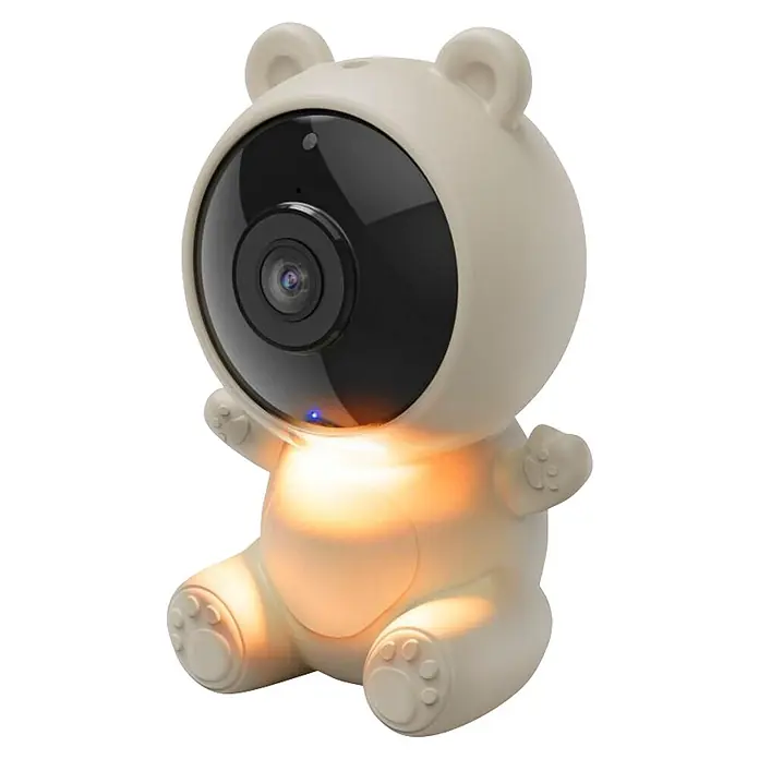 Hama Überwachungskamera 00176673 WLAN mit Kamera -  - Bärenförmige Babykamera in Hellbeige mit Kameraobjektiv als Gesicht. Der Körper leuchtet warm, eine blaue LED ist sichtbar.