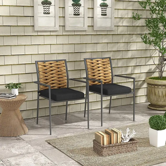 Outsunny Gartenstuhl-Set - 2 Stk., PE-Rattangeflecht, Mehrfarbig, B x T x H: 58 x 58 x 87 cm - Zwei Garten-Sessel mit grauem Metallgestell, schwarzen Kissen und geflochtenen Korbrückenlehnen auf einer Terrasse.
