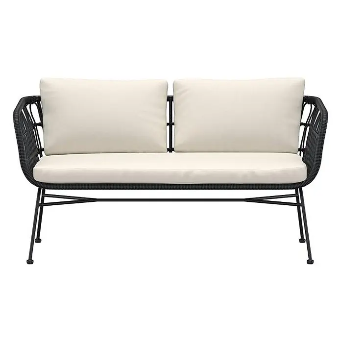 Ebuy24 Loungesofa Isola - B x T x H: 67 x 140 x 71 cm, Stahl., Schwarz - Schwarzes Outdoor-Zweisitzer-Sofa mit geflochtenem Rahmen und cremefarbenen Kissen.