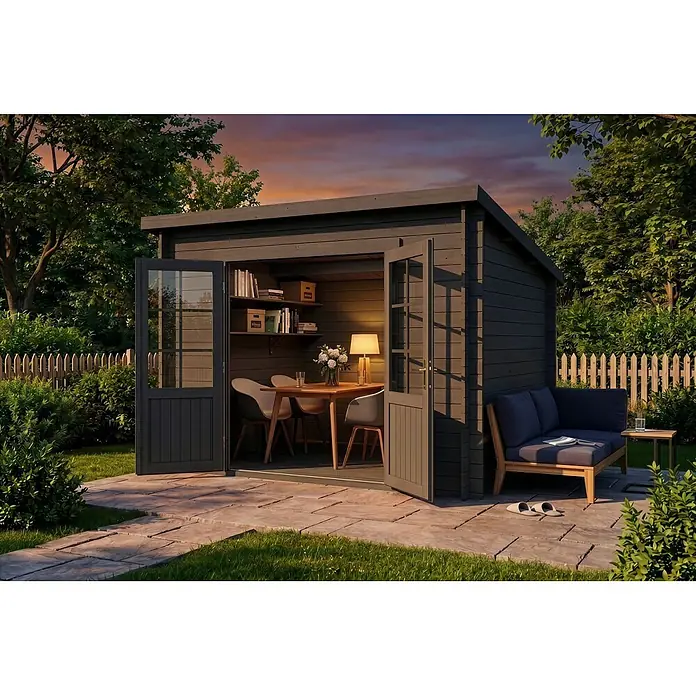 Alpholz Gartenhaus Maria - Außenmaß inkl. Dachüberstand (B x T): 300 x 272 cm, Holz, Grau - Dunkelgraues Gartenbürohaus mit offenen Türen, das einen beleuchteten Essbereich innen und einen Lounge-Bereich außen bei Dämmerung zeigt.