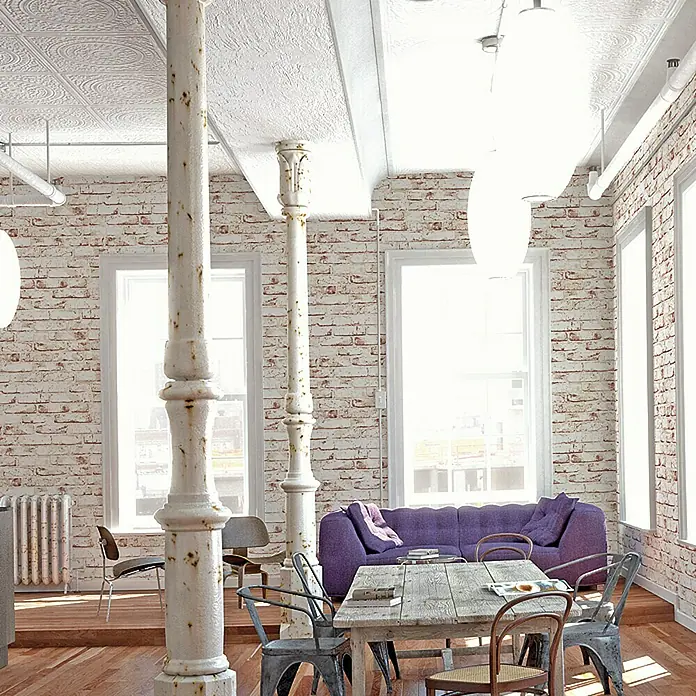 A.S. Création Casual Living Vliestapete New England Klinker - Grau/Anthrazit, Steinoptik, 10 x 0,53 m - Ein modernes Wohnzimmer mit einem Holztisch und Stühlen. Der Raum ist hell und freundlich, mit einem lila Sofa im Hintergrund.