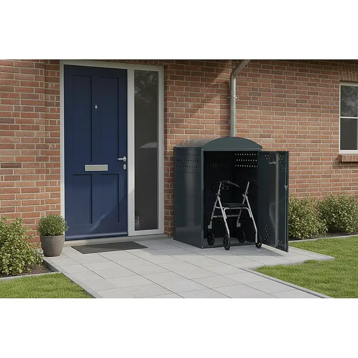 WSM Fahrradgarage Rollatorbox Bogendach - Anthrazit - Dunkelgraue Outdoor-Aufbewahrungsbox mit gewölbtem Dach und perforierten Seiten, enthält einen Rollator neben einem Hauseingang.