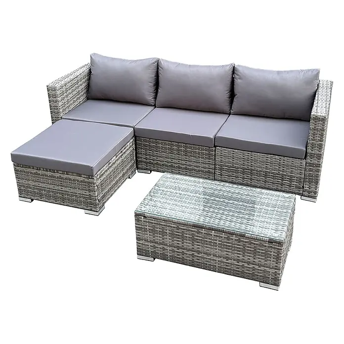 SVITA Loungemöbel-Set QUEENS - 5 -tlg., Grau - Graues Rattan-Ecksofa mit Ottomane und Couchtisch, alle mit grauen Kissen und Glasplatte.