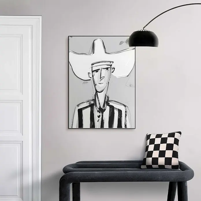Reinders Bild Slim Frame Black - Modern Cowboy, B x H: 50 x 70 cm - Schwarz-weißer Kunstdruck eines Mannes mit Hut und gestreiftem Hemd über einer grauen Bank.
