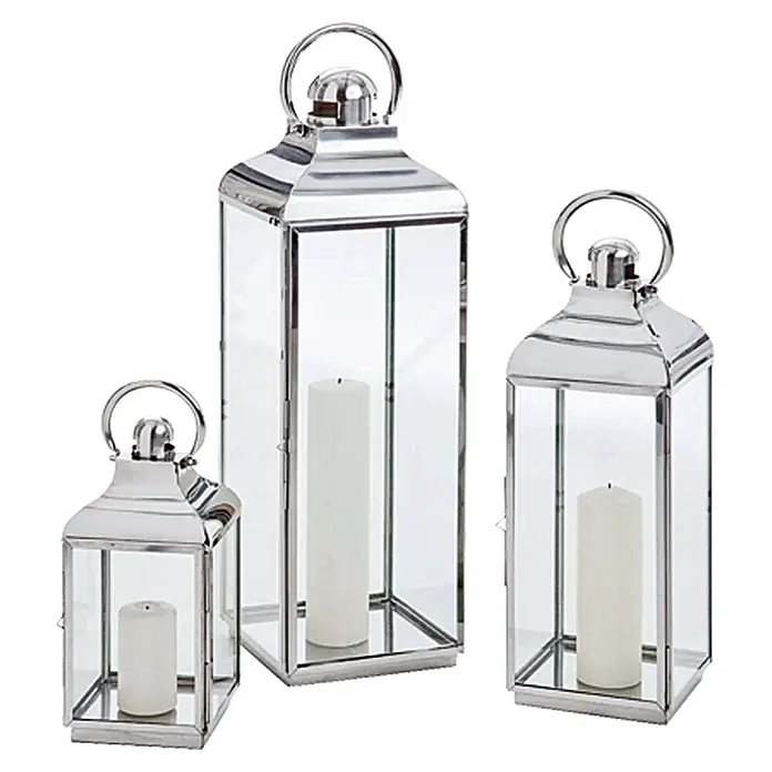 Farolillo de acero inoxidable Berta - 17 x 17 x 38 cm - Elegante juego de tres faroles de acero inoxidable pulido con paneles de vidrio y velas. Iluminación decorativa para espacios interiores y exteriores.