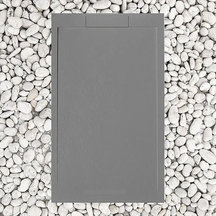 FRASCIO New Tecnology Duschwanne Duschwanne - L x B: 1.200 x 900 mm, Verbundwerkstoff, Grau - Graue, rechteckige Duschwanne auf weißen Kieselsteinen.
